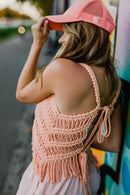 Blouse with a symmetrical pattern and fringes
